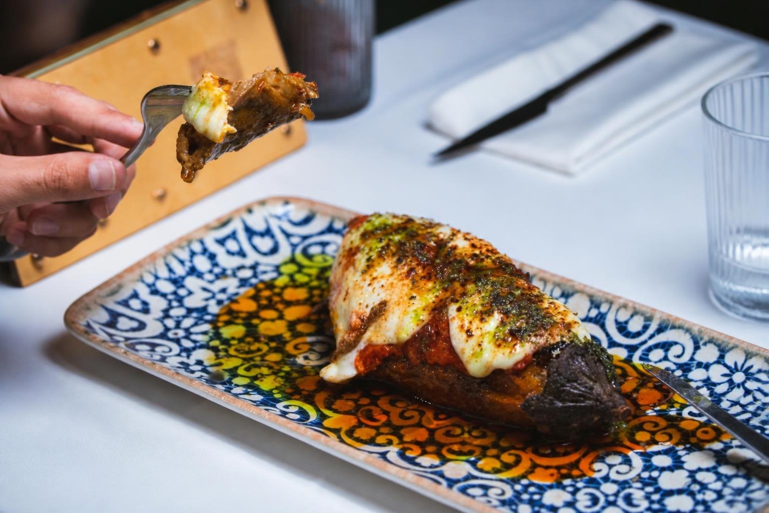 Berenjena asada con sobrasada ibérica y queso fundido